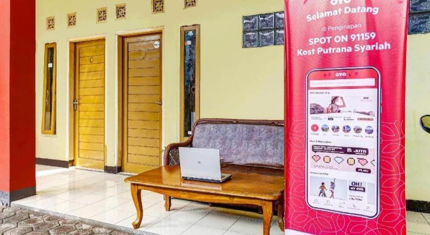 Spot On 91159 Kost Putrana Syariah 2*